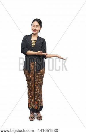 Beautiful Woman Wearing Traditional Javanese Clothes Presenting