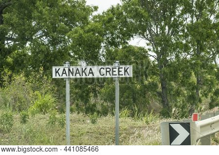 Bruce Highway Townsville To Mackay, Queensland, Australia - November 2021: Kanaka Creek Signpost On 