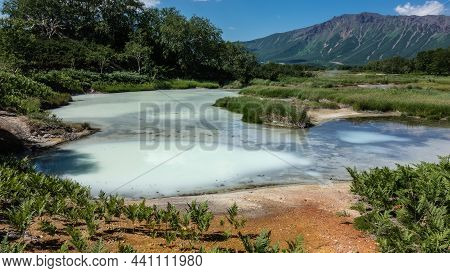 In The Crater Of An Extinct Volcano There Is A Geothermal Lake With Blue Opaque Water. Sulphurous De