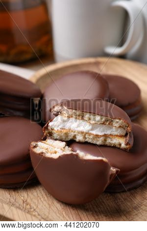 Tasty Choco Pies On Wooden Plate, Closeup View
