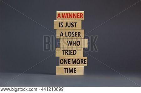 Winner Or Loser Symbol. Wooden Blocks With Words A Winner Is Just A Loser Who Tried One More Time. B