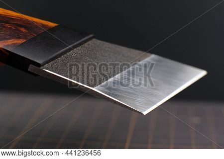 Macro - Exclusive Handmade Leather Craft Wooden Skiving Knife Blade . Close Up Tanner Tool Charterma