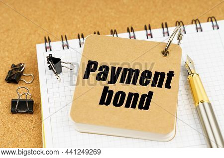 Economy And Business Concept. On The Table Is A Pen And A Notebook With The Inscription - Payment Bo