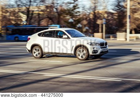 White Color Car Bmw X6 F16 Xdrive30d In Fast Motion On The Autumn City Street. Moscow, Russia - Octo