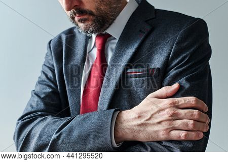 Arms Gripping, Restrained Insecure Businessman Waiting For Bad News, Crossed Arms Posture Body Langu