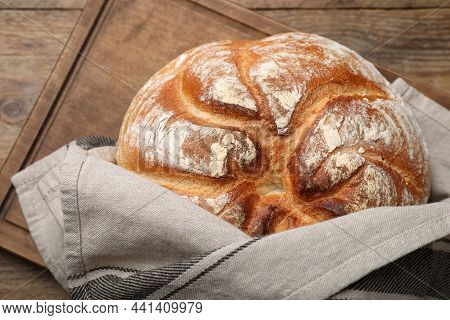 Loaf Of Tasty Wheat Sodawater Bread On Wooden Table, Top View