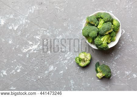 Broccoli Of Fresh Green Broccoli In Bowl Over Coloredbackground. , Close Up. Fresh Vegetable.