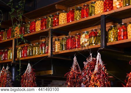 Pickled Vegetables. Salting Various Vegetables In Glass Jars For Long-term Storage. Preserves Vegeta
