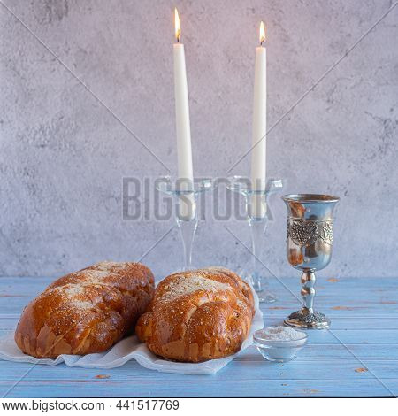 Shabbat Shalom - Challah Bread, Shabbat Wine And Candles On Wooden Table.
