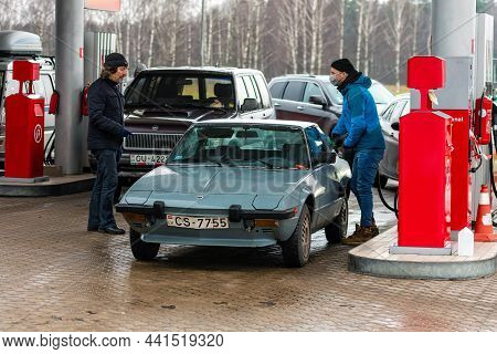 Riga, Latvia, January 2, 2021: The Driver Is Refueling At The Circle K Petrol Station