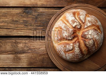 Loaf Of Tasty Wheat Sodawater Bread On Wooden Table, Top View. Space For Text