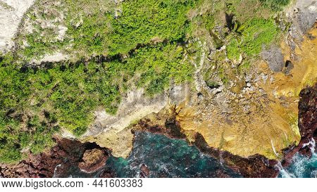 Dangerous Wooden Walkway Hanging Alongside A Vertical Cliff. Extremely Dangerous Footpath On A Cliff