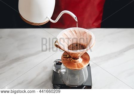 Barista Making Pour-over Coffee With A Hario V60 Dripper, Close Up