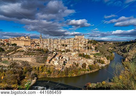 Toledo, Spain. Old City With Its Alcazar, Royal Palace Over The Tagus River Sinuosity. Spain, Europe