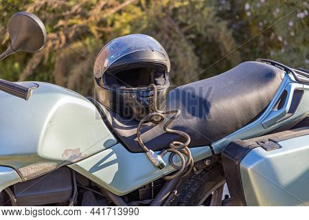Safety Helmet Chained To Big Motorcycle Protection