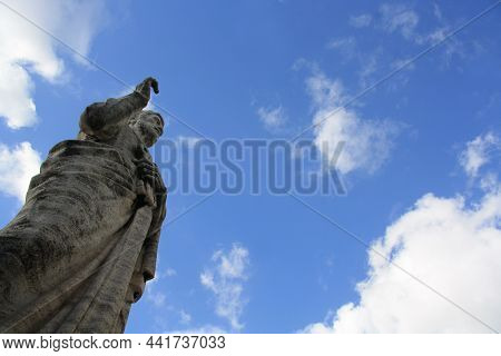Old Giant Statue In Front Of The Basilica Of Saints Peter And Paul In Eur District, Rome. The Apostl