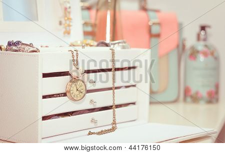 Jewelry With Vintage Clock And Female Complements In Soft Pastel Colors