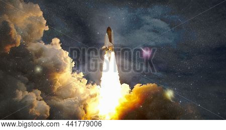 Space Shuttle Taking , Spaceship Lift Off With Blast And Smoke On The Background Of The Blue Planet