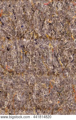 Texture Of Brown Felt Material. Background Of Beige Lining With Fibers From Non-uniform Fabric.