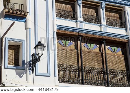 Old Colorful And Majestic Facade With Beautiful Windows Polop Village, Alicante, Spain.