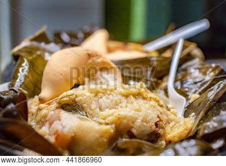Nacatamal Served In Banana Leaf, Close Up Of Nicaraguan Nacatamal, Typical Nicaraguan Food El Nacata