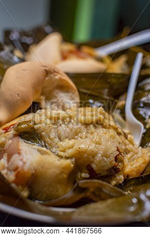 Nacatamal Served In Banana Leaf, Close Up Of Nicaraguan Nacatamal, Typical Nicaraguan Food El Nacata