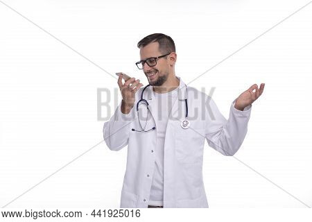 Doctor Talking On Phone Standing Isolated. Doctor Smiling. Commecial, Medicine, Advertisment Concept