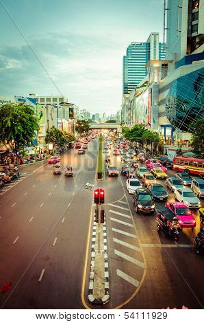 pedestrians and traffic on Sukhumvit road in Bangkok