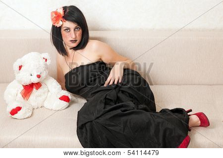 Gothic Woman Lying On The Sofa