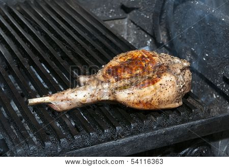 cooking rabbit meat on the grill