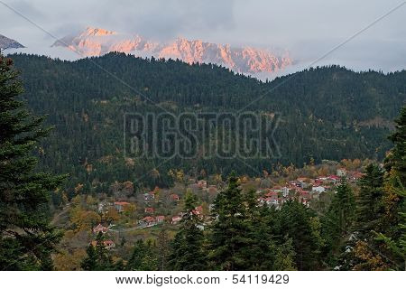 Village And Mountain At Late Afternoon
