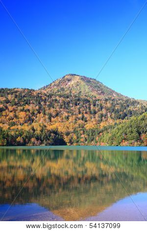 Mountain And Pond In Autumn