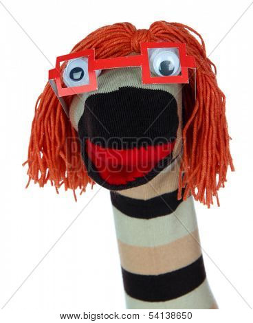 Cute sock puppet isolated on white