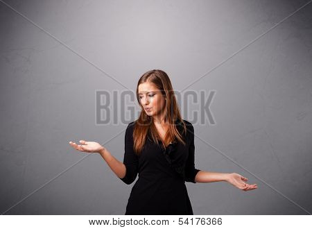 beautiful young lady standing and juggling with copy space