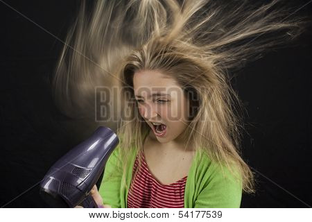 Girl Blowdrying Her Hair