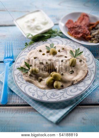 vitello tonnato - veal with tuna and capers,  selective focus