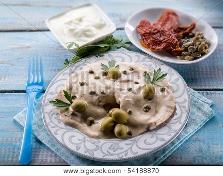 vitello tonnato - veal with tuna and capers,  selective focus