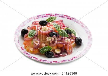 salad with ox heart tomatoes, onions olives and garlic