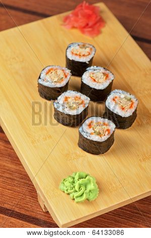 Japanese cuisine - sushi rolls with tobico and pancake