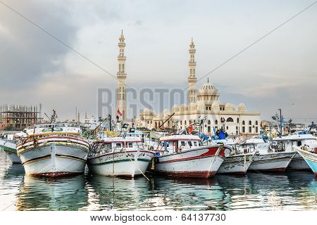 Fishing Boats At The Port Of Hurghada, Hurghada Marina At Sunset Against The Mosque, April 15, 2014,