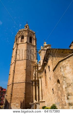 Valencia Cathedral facade and Miguelete Micalet in Plaza de la Reina at Spain