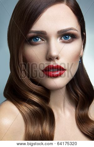 Portrait of beautiful girl with red lips.