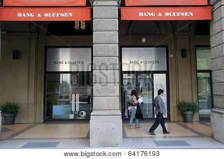 BOLOGNA, ITALY - APRIL 19, 2014: Pedestrians walk past a Bang & Olufsen (B&O) home electronics store in Bologna, Italy, on Saturday, April 19, 2014. 