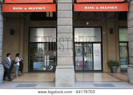 BOLOGNA, ITALY - APRIL 19, 2014: Pedestrians walk past a Bang & Olufsen (B&O) home electronics store in Bologna, Italy, on Saturday, April 19, 2014. 