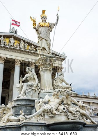 the parliament in vienna, austria. with the statue of 