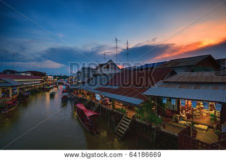 Floating market amphawa in sunset time