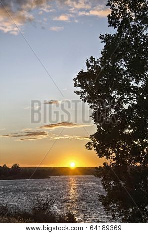 Sunset Over The Water