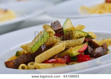 Pasta with shrimps, herbs and mashrooms isolated on white background in studio