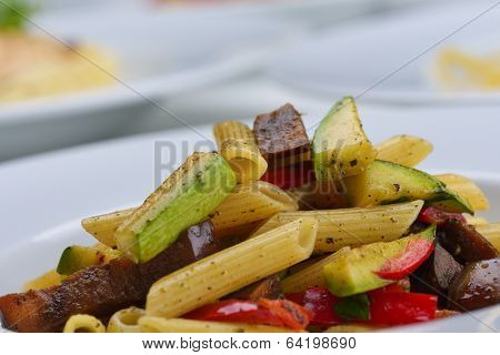 Pasta with shrimps, herbs and mashrooms isolated on white background in studio