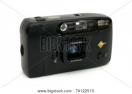 Old compact film camera, isolated on white background